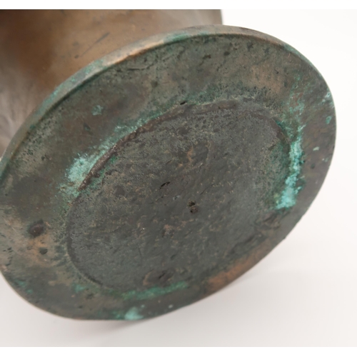 206 - An antique bronze mortar and pestle, 11cm high, together with a ship's lamp, 35cm high (2)