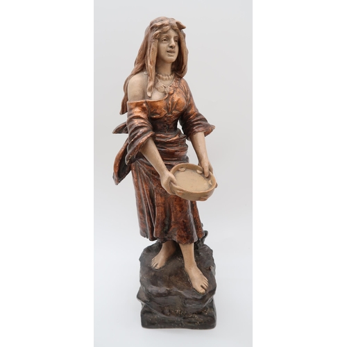 214 - A Parian figure of a man feeding his dog, 37cm high, another of a courting couple, 49cm high, and a ... 