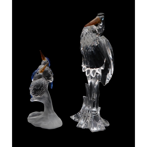 225 - A collection of Swarovski crystal including a Heron, kingfishers, Zodiac dragon, a mermaid and dolph... 