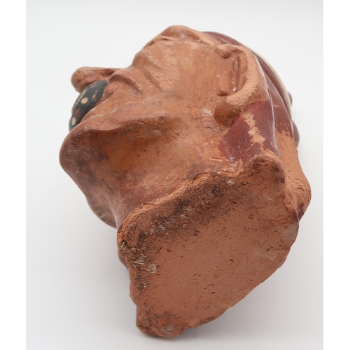 233 - A moche portrait vessel, in the Pre-Colombian style, 29cm high