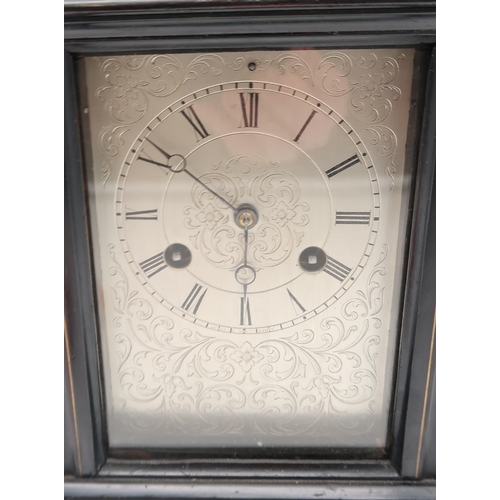238 - A French marquetry rosewood carriage clock, by Henry Marc of Paris, 21cm high, another ebonised Fren... 