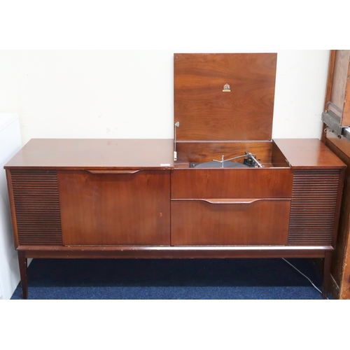 66 - A mid 20th century stained teak Dynatron radiogram with Garrard turntable, 64cm high x 140cm wide x ... 