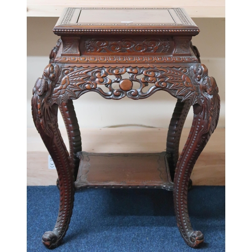 8 - A 20th century Chinese hardwood two tier jardinière stand with square top over pierced carved... 