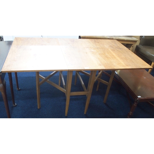 80 - A mid 20th century teak A H McIntosh Ltd gate legged dining table with twinned crossed gate leg ends... 