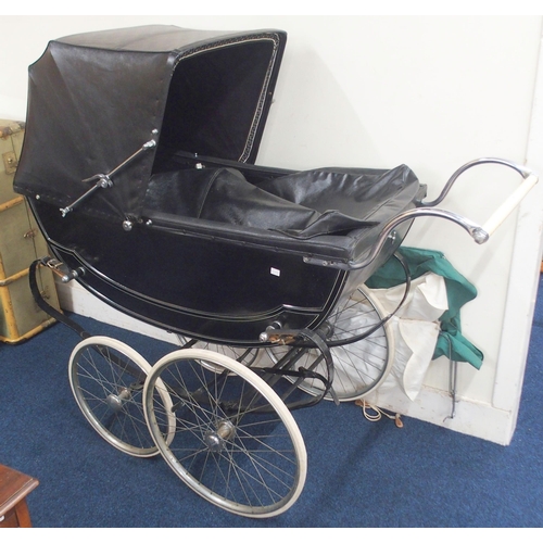 85 - An early 20th century Millsons Ltd pram with black lacquered carriage on black suspension with white... 