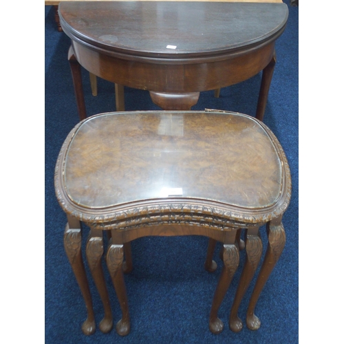 88 - A lot comprising an early 20th century nest of three tables and a mahogany demi lune fold over card ... 