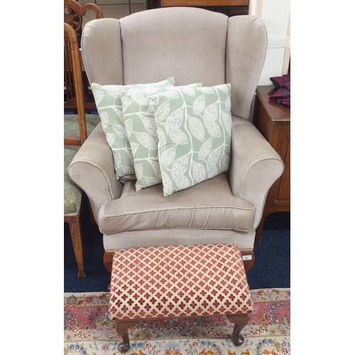 92 - A lot comprising a contemporary grey upholstered wingback armchair, 102cm high x 89cm wide x 88cm de... 