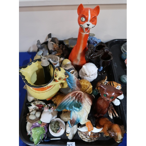 265 - A collection of animal figures including John Jenkins owls, sylvac bunnies, USSR tigers etc