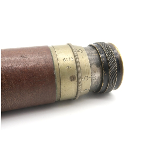 433 - A WW2 period leather-clad military-issue telescope, stamped with Broad Arrow and numbered 6179