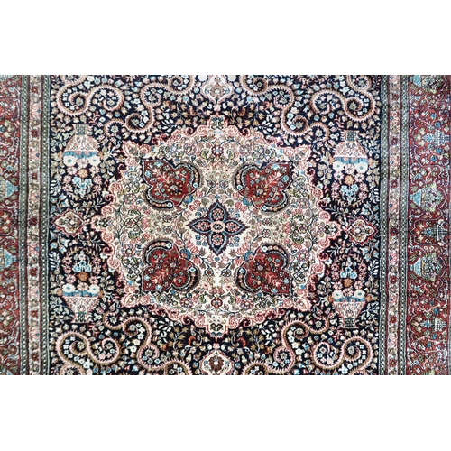 2178 - A DARK BLUE GROUND CHINESE FINE SILK RUG with cream central medallion and matching spandrels on flor... 