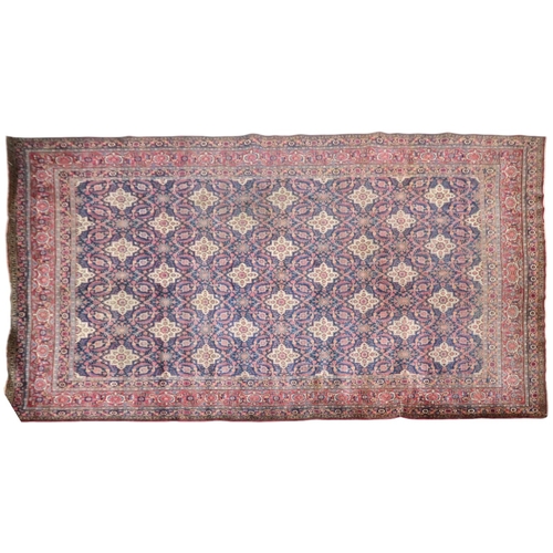 2182 - A BLUE GROUND PERSIAN FERAHAN PATTERNED RUG with all over cream medallion design on geometric floral... 