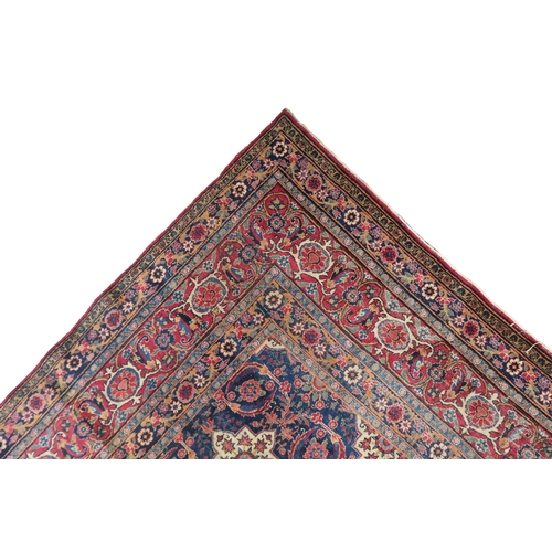 2182 - A BLUE GROUND PERSIAN FERAHAN PATTERNED RUG with all over cream medallion design on geometric floral... 