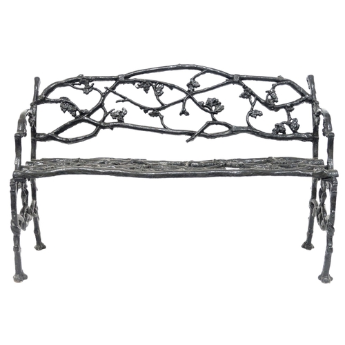 2009 - A 19TH CENTURY CAST IRON COALBROOKDALE STYLE GARDEN BENCH with black painted back, seat and sides ca... 