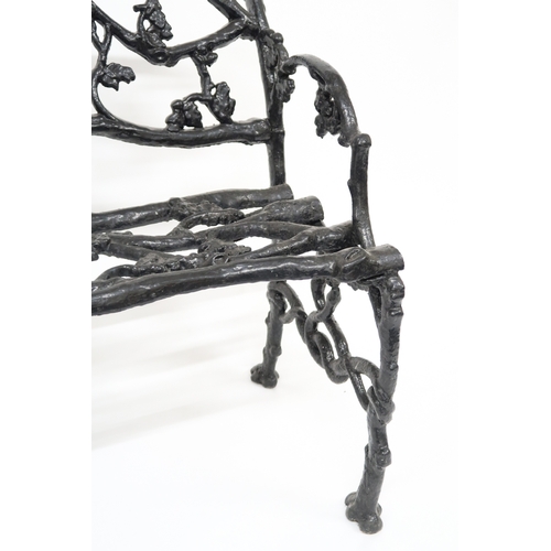 2009 - A 19TH CENTURY CAST IRON COALBROOKDALE STYLE GARDEN BENCH with black painted back, seat and sides ca... 