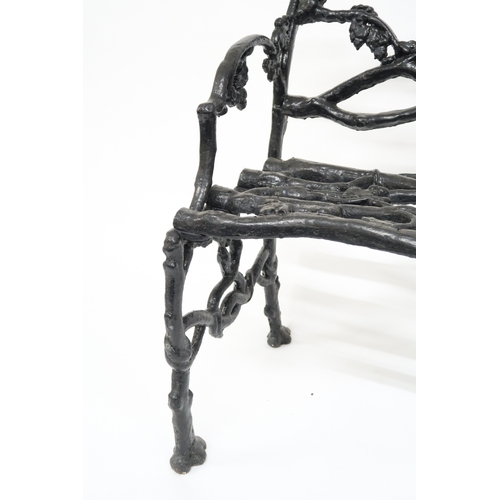 2009 - A 19TH CENTURY CAST IRON COALBROOKDALE STYLE GARDEN BENCH with black painted back, seat and sides ca... 