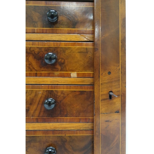 2010 - A VICTORIAN WALNUT VENEERED APPRENTICE STYLE WELLINGTON CHEST with inverted breakfront cornice over ... 