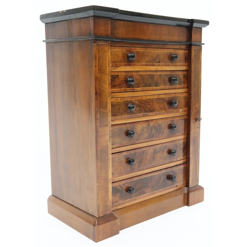 2010 - A VICTORIAN WALNUT VENEERED APPRENTICE STYLE WELLINGTON CHEST with inverted breakfront cornice over ... 