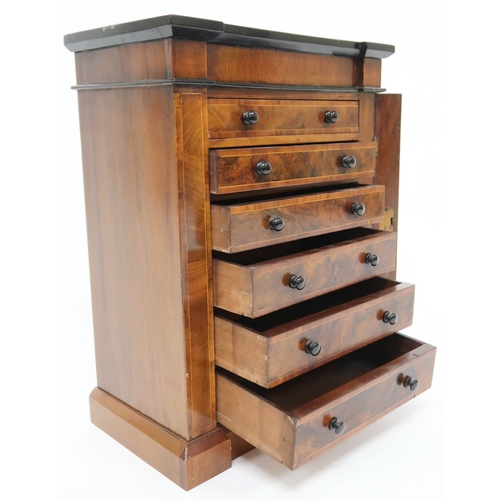 2010 - A VICTORIAN WALNUT VENEERED APPRENTICE STYLE WELLINGTON CHEST with inverted breakfront cornice over ... 