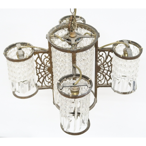 2014 - A 19TH CENTURY GILT BRASS SECTIONAL BASKET CHANDELIER with central cylindrical basket flanked on fou... 