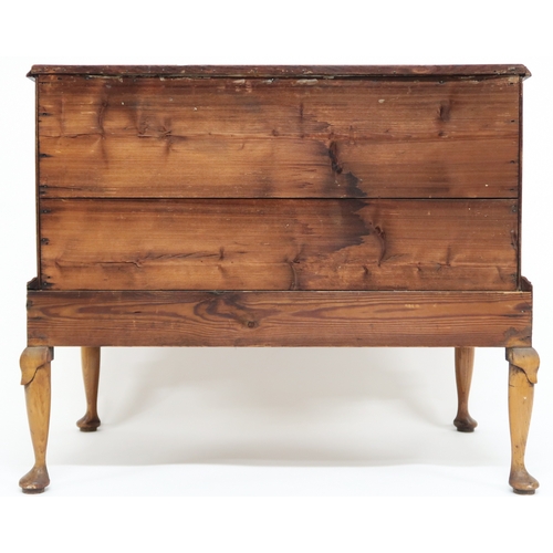 2015 - A GEORGIAN WALNUT VENEERED CHEST OF DRAWERS with rectangular cross banded veneer top over two short ... 