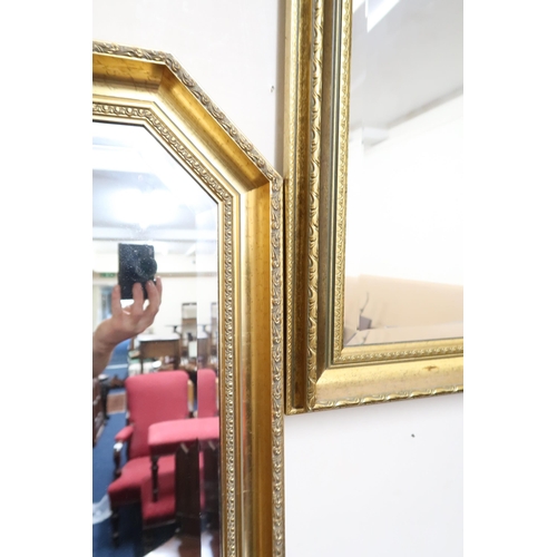 131 - A pair of 20th century gilt framed bevelled glass wall mirrors, 72cm high x 103cm wide (2)