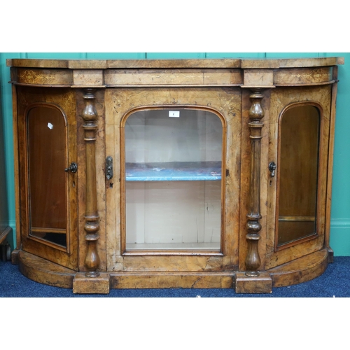 2 - A 19th century continental style burr walnut veneered credenza with shaped top over central glazed d... 