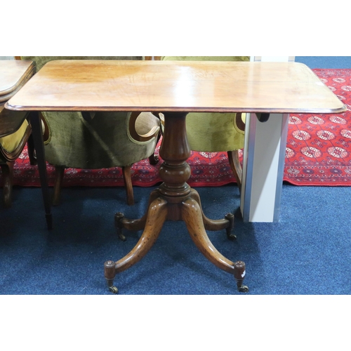 22 - A 19th century mahogany tilt top table with rectangular tilt top on turned pedestal quadrupedal base... 