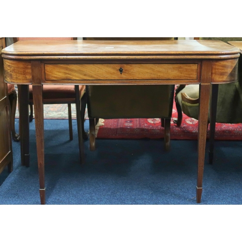 23 - A 19th century mahogany fold-over tea table with single drawer on square tapering supports, 75cm hig... 