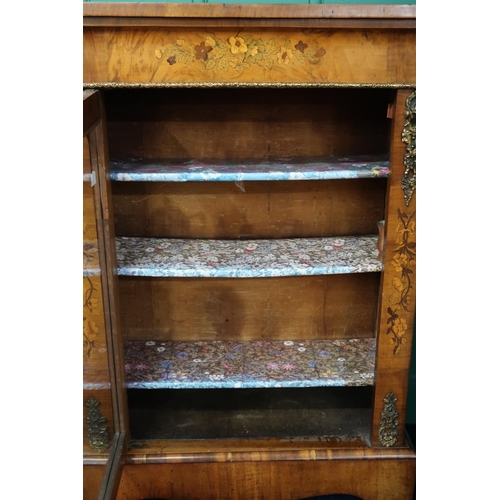 3 - A 19th century Louis XVI style walnut and fruit wood marquetry veneered pier cabinet with brass ormo... 