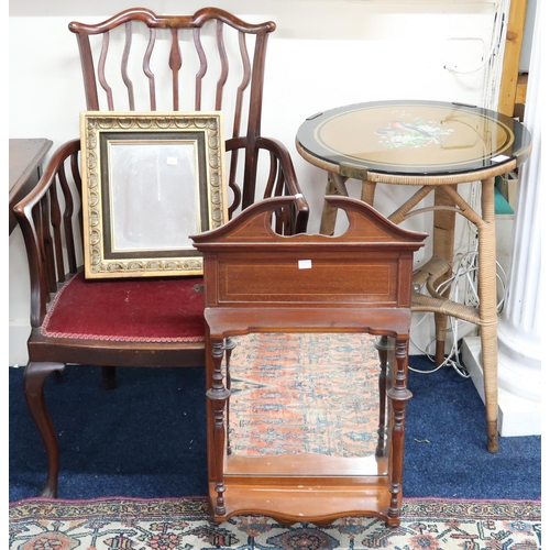 35 - A lot comprising an early 20th century mahogany framed rail back armchair, circular topped wicker ba... 