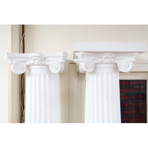 36 - A pair of large faux marble Greek Ionic style columns, 212cm high (2)