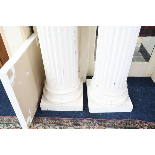 36 - A pair of large faux marble Greek Ionic style columns, 212cm high (2)