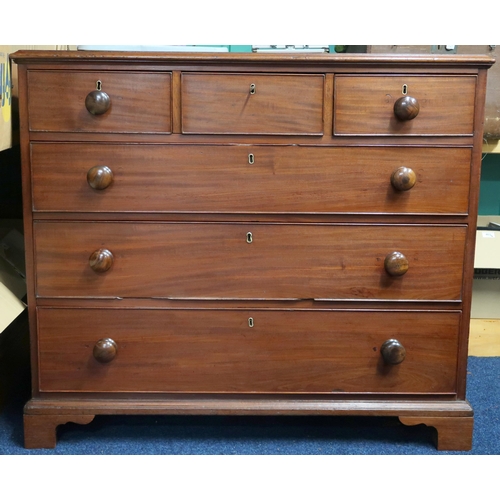 39 - A George III mahogany three short over three long chest of drawers with replacement turned Victorian... 