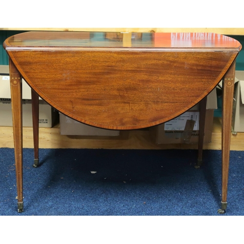 43 - A Victorian mahogany oval topped drop side Pembroke table with single frieze drawer on square taperi... 