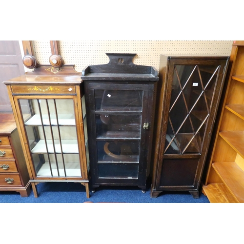 56 - A lot comprising an Edwardian mahogany glazed display cabinet, a glazed bookcase and another oak gla... 