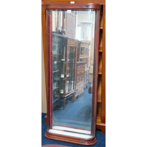 58 - A Victorian mahogany mirror backed wall mounted display case with bowed glazed door 144cm high x 57c... 