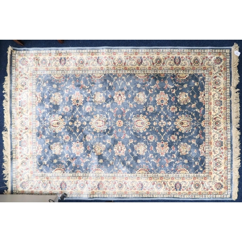 74 - A duck egg blue full pile kashmir Zeigler rug with all over floral patterned design within ivory flo... 