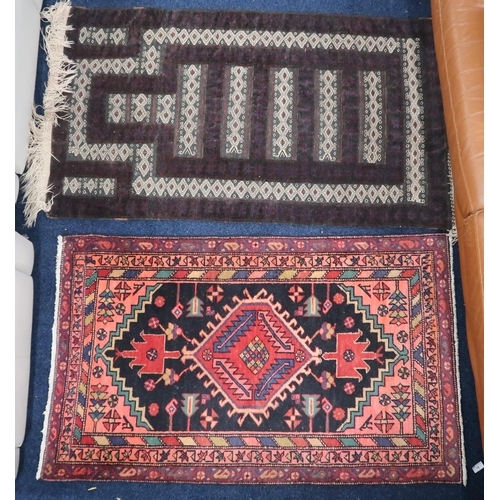 76 - A lot comprising a dark ground Hamadan style rug with geometric design, 138cm long x 83cm wide and a... 