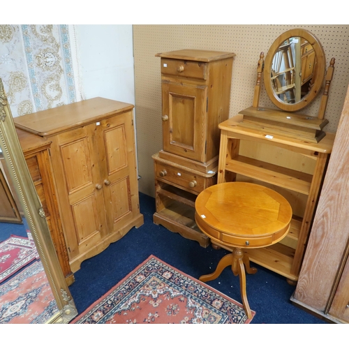 84 - A mixed lot to include a pine two door side cabinet, two assorted pine bedside tables, a pine open b... 