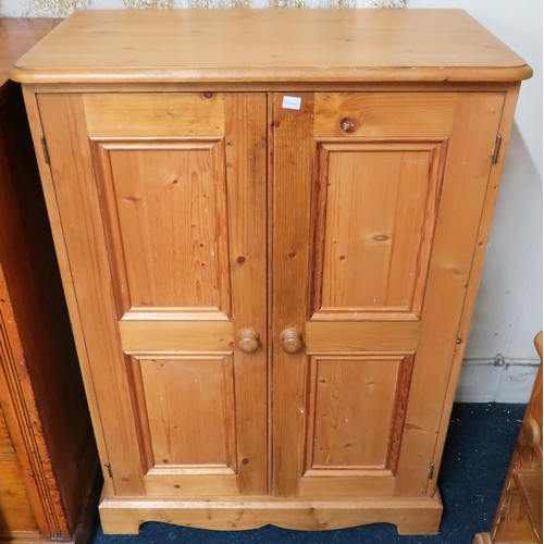 84 - A mixed lot to include a pine two door side cabinet, two assorted pine bedside tables, a pine open b... 