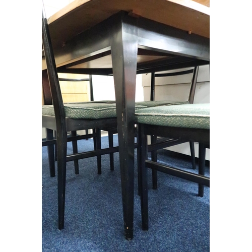 90 - A mid 20th century Meredew Furniture dining suite consisting extending dining table with teak top on... 