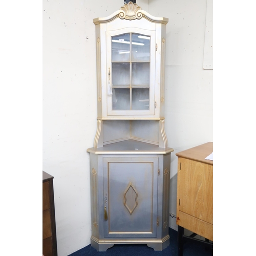 92 - A lot comprising a silver painted continental style corner cabinet, 203cm high x 72cm wide and a 20t... 