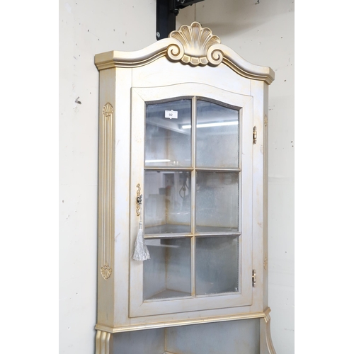 92 - A lot comprising a silver painted continental style corner cabinet, 203cm high x 72cm wide and a 20t... 