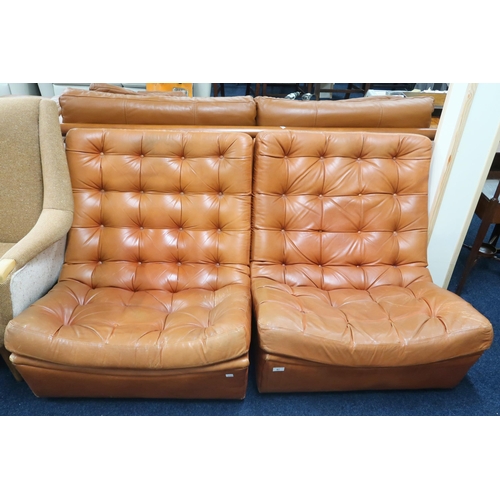 97 - A pair of mid 20th century brown leather button upholstered lounge chairs, 75cm high x 79cm wide x 9... 