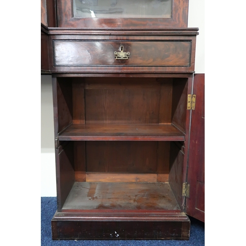 2018 - A LARGE 19TH CENTURY MAHOGANY BREAKFRONT LIBRARY BOOKCASE with stepped moulded cornices over pair of... 