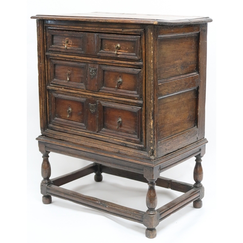 2019 - A 17TH CENTURY OAK JACOBEAN CHEST ON STAND with three graduating drawers on base with turned support... 