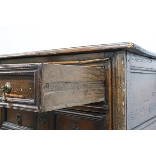 2019 - A 17TH CENTURY OAK JACOBEAN CHEST ON STAND with three graduating drawers on base with turned support... 