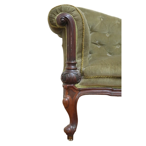 2030 - A VICTORIAN ROSEWOOD FRAMED BUTTONBACK UPHOLSTERED GOSSIP SOFA with scrolled arms on carved supports... 