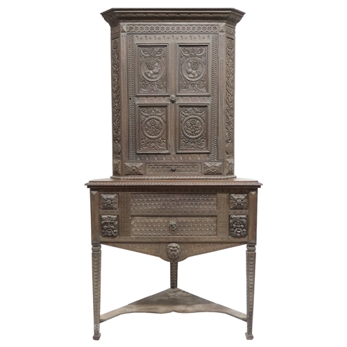 2032 - A LARGE 17TH CENTURY STYLE OAK CORNER CABINET ON STAND with gadrooned moulded cornice over single ca... 