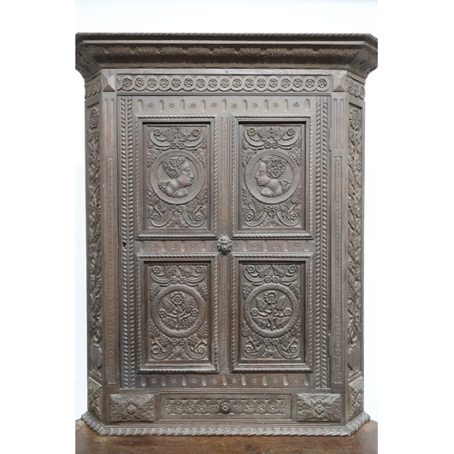 2032 - A LARGE 17TH CENTURY STYLE OAK CORNER CABINET ON STAND with gadrooned moulded cornice over single ca... 